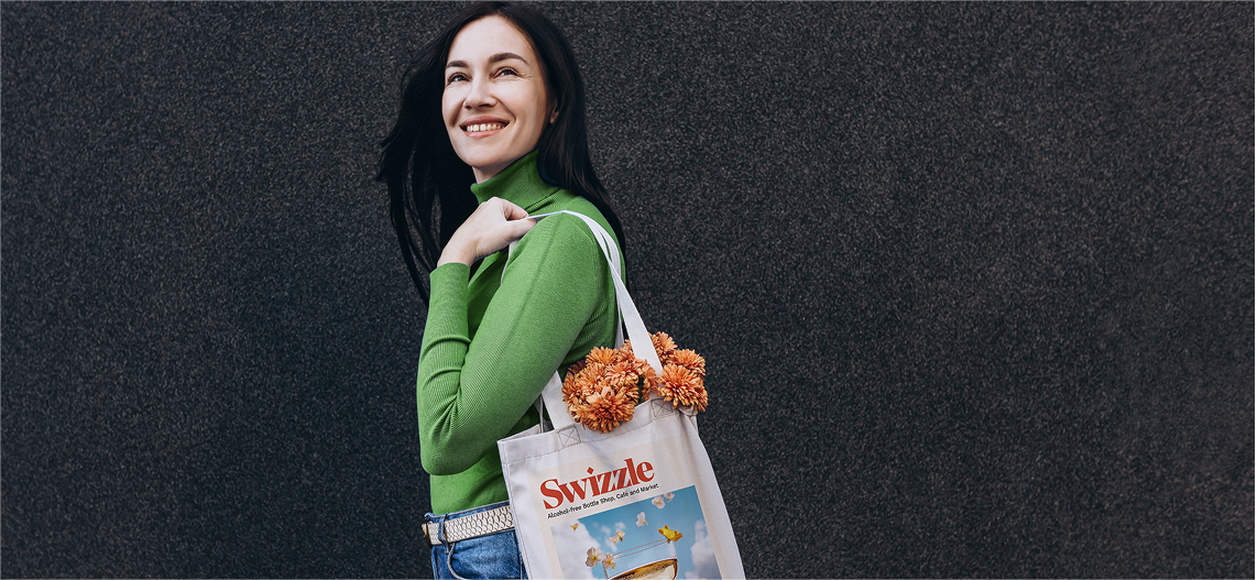 Community Voices - Woman with Swizzle tote bag